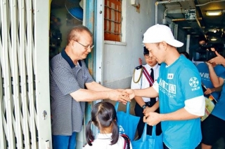 Pierre Ngo gave blessing bags to make the elderlies happy